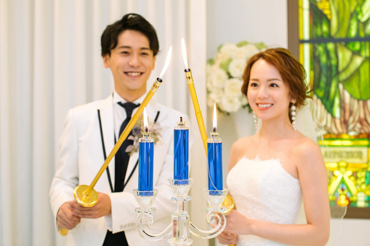 それぞれの人生を歩んできたお二人やご家族がひとつになるよう願いを込められたユニティキャンドルセレモニー